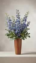 Slate Blue Delphinium and Eucalyptus Centerpiece in Walnut Vessel